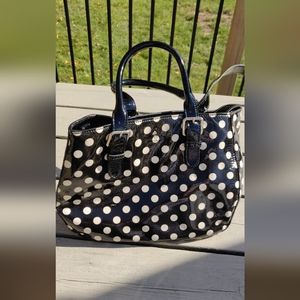 Gently used, paten leather Kate Spade purse, black & whit polkadot.